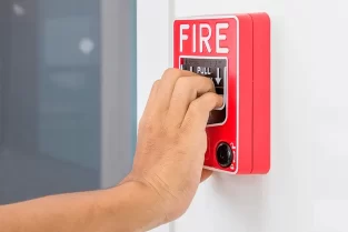 hand-man-pulling-fire-alarm-switch-white-wall-as-background-emergency-case